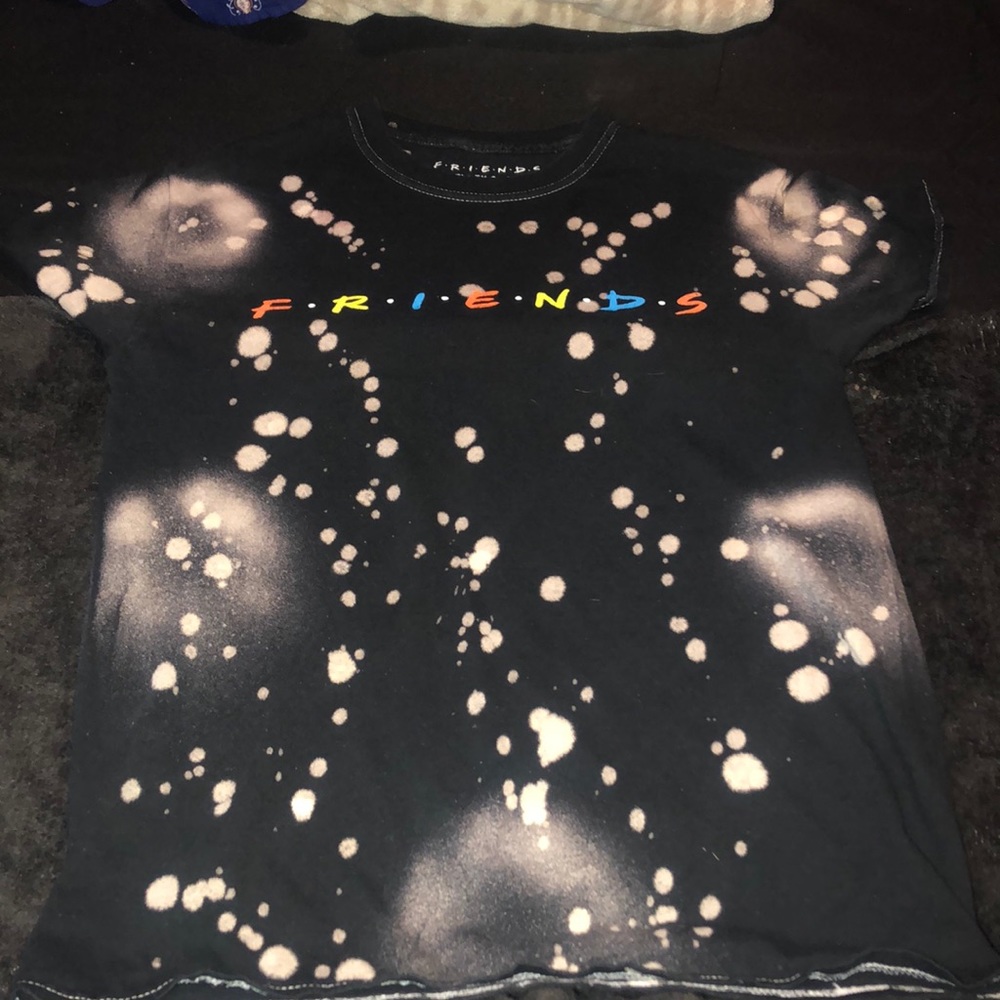 The shirt brand is friends the tv series. Size small worn ones